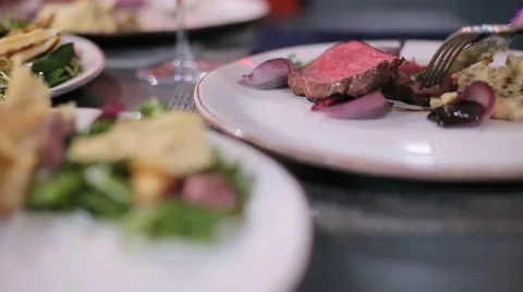 Cutting steak on the plaete close up Stock Footage 67864422