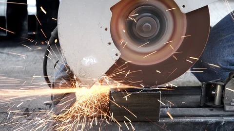 Cutting steel with spark stream from machine Stock Footage 124037972