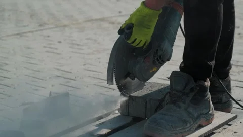 Cutting stone at a construction site Stock Footage 279816863
