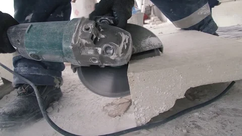 Cutting stone with a saw. Work tool. Stock Footage 83396492