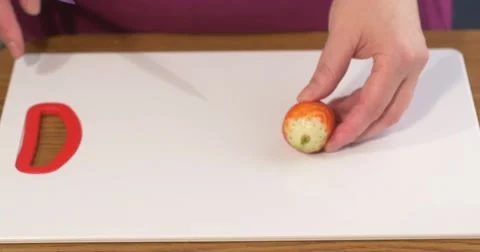 Cutting strawberries on cutting board Stock Footage 48687340