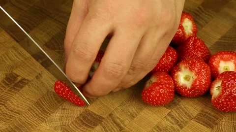 Cutting strawberries Stock Footage 58493700