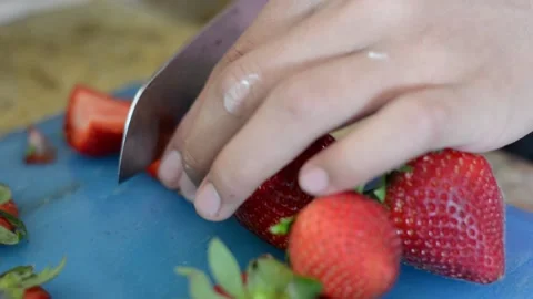 Cutting Strawberries Stock Footage 130356563