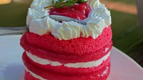 Cutting strawberry cake on cafe table. Stock Footage 305040757