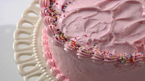 Cutting a strawberry cream cake Stock Footage 8570393