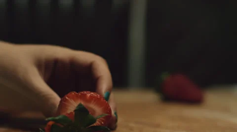 Cutting a strawberry Stock Footage 52517418
