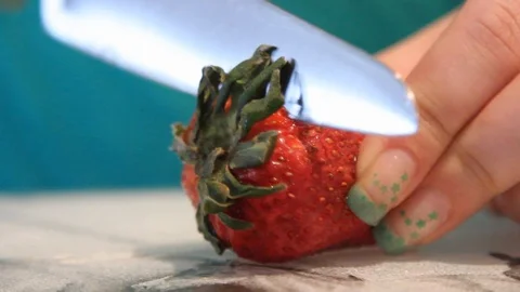 Cutting strawberry Stock Footage 100616532