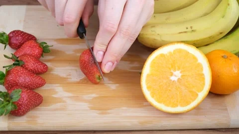 Cutting strawberry Stock Footage 233265683