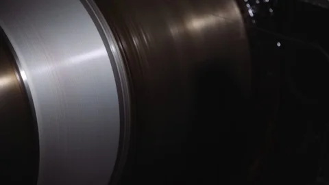 The cutting string for metal is wound on a round shaft. Machine in work in the Stock Footage 116442596