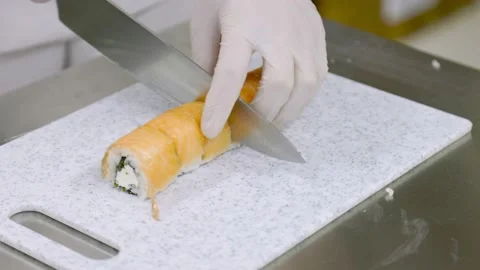 Cutting sushi with a knife Stock Footage 150550277
