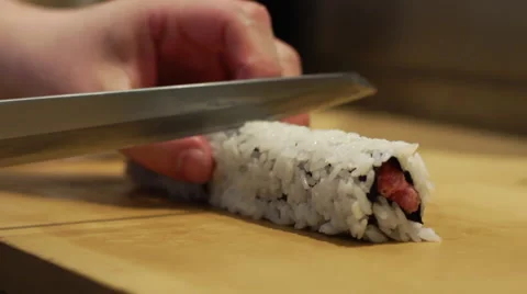 Cutting Sushi Roll Stock Footage 40734642