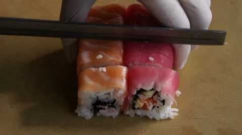 Cutting sushi rolls Stock Footage 39193514