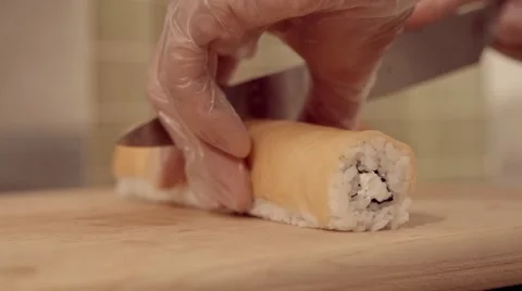 Cutting the sushi in slow motion Stock Footage 67857281
