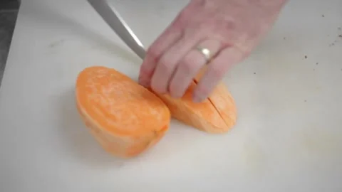 Cutting sweet potatoes Stock Footage 307340045