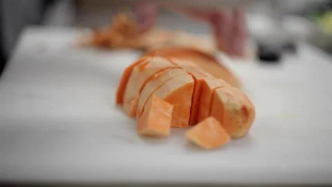 Cutting sweet potatoes Stock-Footage 307340049