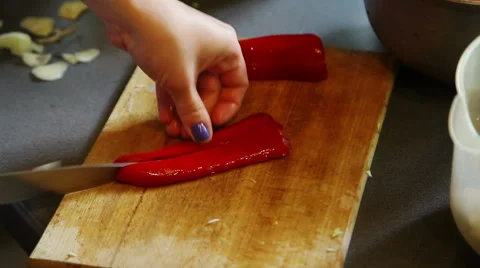 Cutting sweet red pepper Stock Footage 41301183