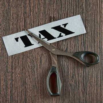 Cutting tax image Stock Photos