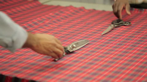 Cutting a texture with scissors Stock Footage 31447158