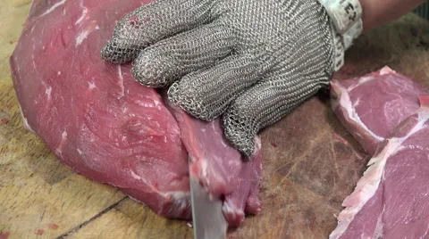 Cutting thin veal cutlets Stock Footage 55768449