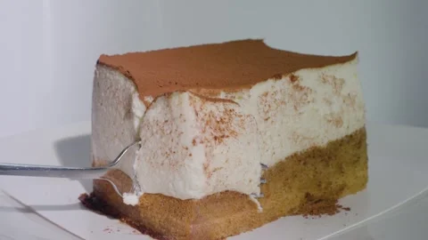 Cutting Through A Slice Of Tiramisu Stock Footage 310035573