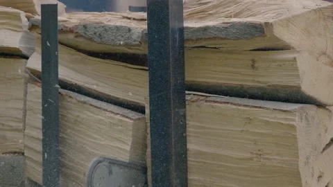 Cutting through wood with chainsaw Stock Footage 161754089