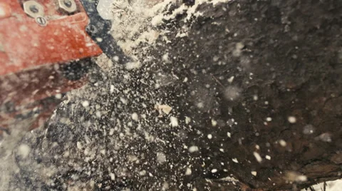 Cutting through wood with chainsaw in super slow motion. Stock Footage 62522746