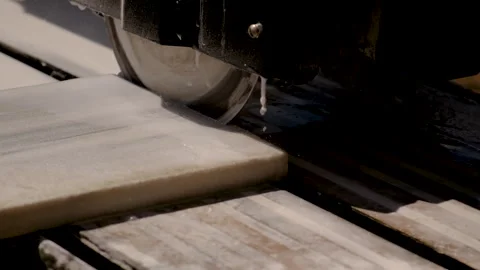 Cutting tiles with a machine. Selective focus. Stock Footage 317259802
