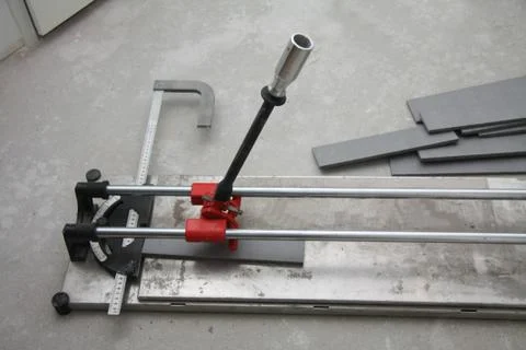 Cutting tiles Stock Photos