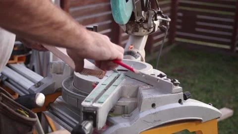 Cutting timber on drop saw close up Vídeo Stock 137442199