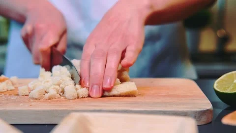 Cutting toast bread on the kitchen Stock Footage 250322759