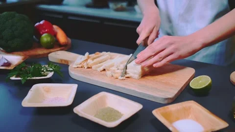 Cutting toaster bread into strips Stock Footage 252361950