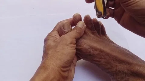 Cutting toenails Stock Footage 289811746