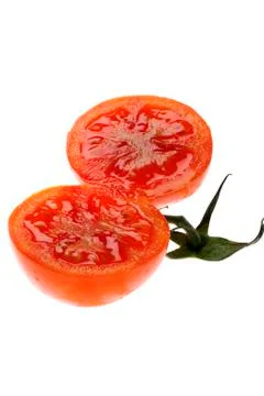 Cutting tomato close up Stock Photos