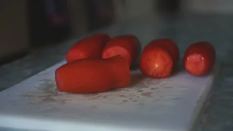 Cutting Tomato on Cutting Board Video stock 99244030