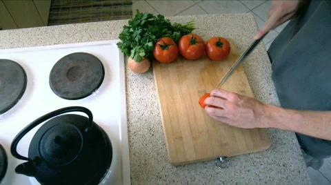 Cutting a Tomato Stock Footage 730529