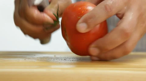 Cutting tomato Stock Footage 27305590