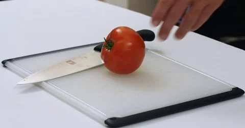 Cutting a tomato Stock Footage 78988375
