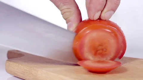 Cutting Tomato Stock-Footage 85012575