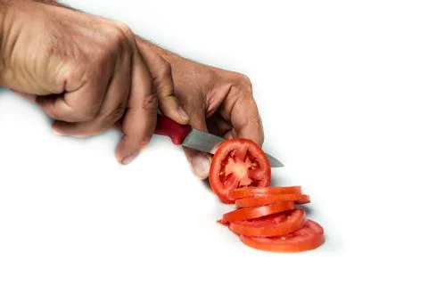 Cutting a tomato Stock Photos