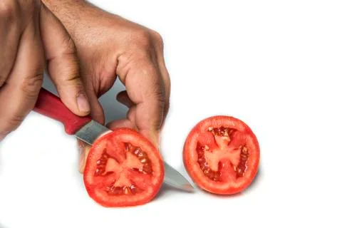 Cutting a tomato Stock Photos
