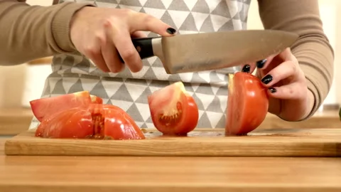 Cutting tomato slices Stock Footage 201325842