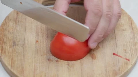 Cutting Tomato Into Small Pieces Stock Footage 327534440