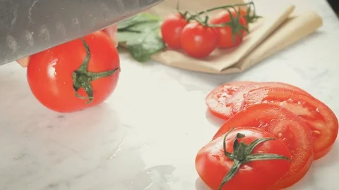 Cutting tomato, tomatoes sliced background, fresh ingredient for salad chef Stock Footage 123427146