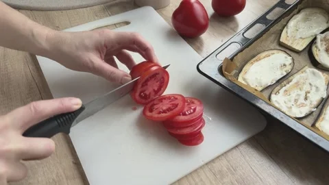 Cutting Tomatoes For Eggplant Bake Preparing Oven Dish Cooking Ingredients Scene 스톡 동영상 336445859
