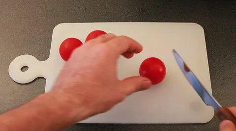 Cutting tomatoes Stock Footage 8569719