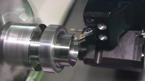Cutting tool at metal working on cnc lather machine Stock Footage 85800158