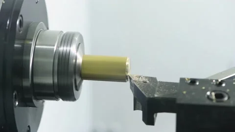 Cutting tool at metal working on cnc lather machine Stock Footage 131398836