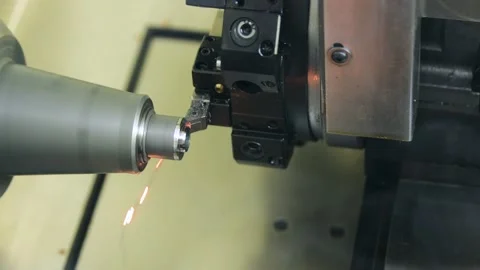 Cutting tool processing steel metal detail on cnc lathe machine Stock Footage 154911599
