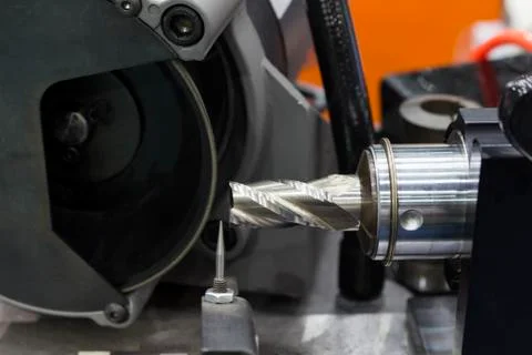 Cutting tool in re-sharpening process machine Stock Photos