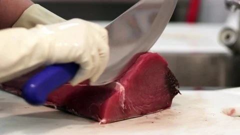 Cutting tuna steak Stock Footage 75452398